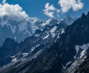 snow covered mountain under blue sky during daytime jigsaw puzzle