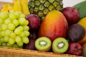 red apple fruit beside green apple and yellow fruit on brown woven basket jigsaw puzzle