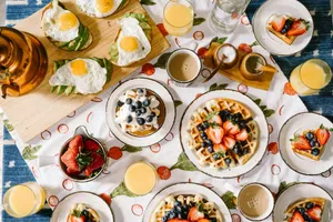 breakfast spread with waffles eggs and juice jigsaw puzzle