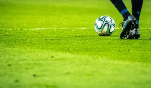 man playing soccer game on field jigsaw puzzle