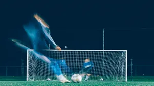 timelapse photo of soccer player kicking ball jigsaw puzzle