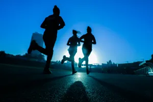 silhouette of three women running on grey concrete road jigsaw puzzle