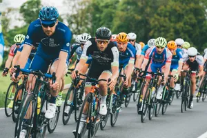 group of cyclist on asphalt road jigsaw puzzle