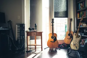 several guitars beside of side table jigsaw puzzle