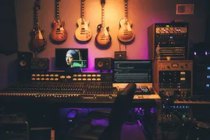 person playing brown and white acoustic guitars jigsaw puzzle