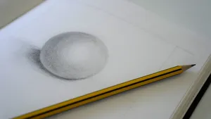 a pencil drawing of a ball and a pencil jigsaw puzzle