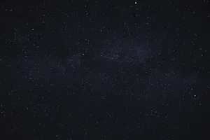 A deep and expansive view of a starry night sky, capturing the beauty of the galaxy. jigsaw puzzle