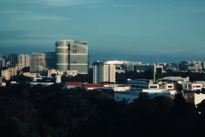 Skyline of Singapore featuring modern architecture under a clear blue sky. jigsaw puzzle