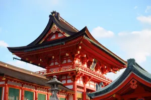 Captivating view of a traditional Shinto shrine in Kyoto, showcasing exquisite architecture beneath a blue sky. jigsaw puzzle