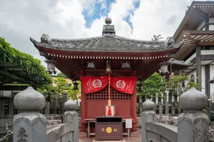 A beautifully detailed Japanese shrine with traditional architecture and vibrant red decorations. Perfect for culture and travel themes. jigsaw puzzle