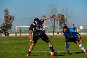 Captured intense moment during a soccer match under clear skies. jigsaw puzzle