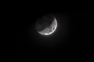 High-resolution image of the moon craters under starry night sky, perfect for astronomy enthusiasts. jigsaw puzzle