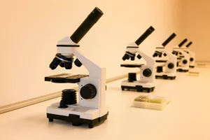 A series of microscopes on a lab table, ideal for scientific research and education. jigsaw puzzle