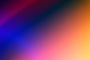 A vivid, colorful gradient blending orange, purple, and blue hues, perfect for digital backgrounds. jigsaw puzzle