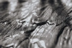 Close-up of abstract black and white textured art with shiny and wet appearance. jigsaw puzzle
