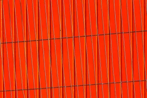 Modern abstract image featuring vertical lines against a bold red background. jigsaw puzzle
