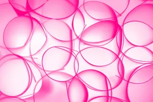 Vibrant abstract pink circles forming a textured background, perfect for modern and artistic designs. jigsaw puzzle