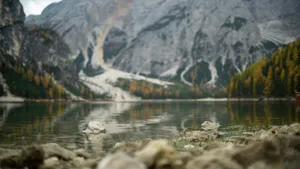 a lake with mountains in the background jigsaw puzzle