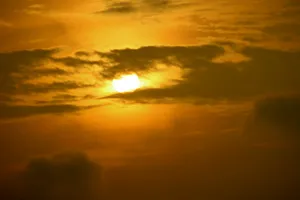 a plane flying in the sky at sunset jigsaw puzzle