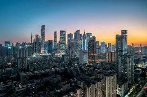 Modern cityscape with illuminated skyscrapers at dusk jigsaw puzzle
