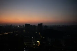 City skyline at dusk with glowing lights jigsaw puzzle