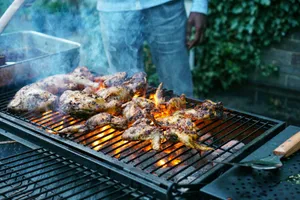 unknown person grilling chicken meat outdoors jigsaw puzzle