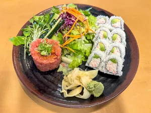 a black plate topped with different types of food jigsaw puzzle