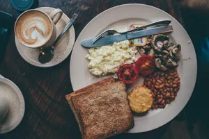 food lot in a white plate near a knife and fork close-up photography jigsaw puzzle