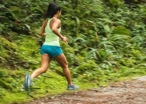 woman in white tank top running on dirt road during daytime jigsaw puzzle