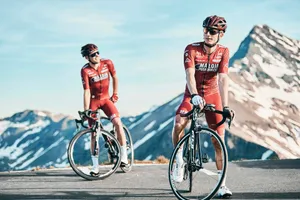 two men biking on road viewing mountain jigsaw puzzle