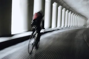 man in black jacket riding bicycle jigsaw puzzle