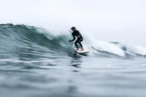 long exposure of man surfing jigsaw puzzle