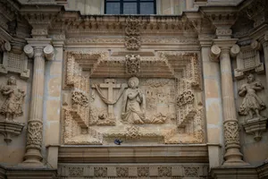 A building with a statue on the side of it jigsaw puzzle