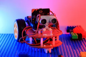 A robot made out of legos sitting on top of a table jigsaw puzzle