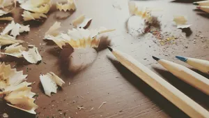 white and brown wooden pencil jigsaw puzzle