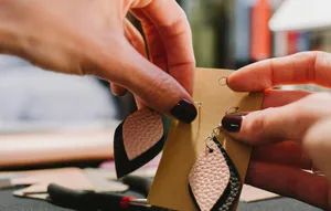 pair of white-and-black leather teardrop earrings jigsaw puzzle