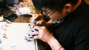 a man is working on a robot model jigsaw puzzle
