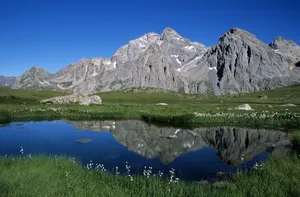 Beautiful mountain vistas reflected in a serene lake in the French Alps. Ideal for nature lovers. jigsaw puzzle