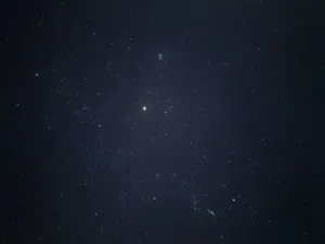 A clear view of the starry sky with bright stars scattered across the night. jigsaw puzzle