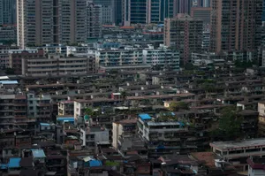 Explore the dense urban architecture and vibrant city life of Guangzhou, China from above in this captivating cityscape image. jigsaw puzzle