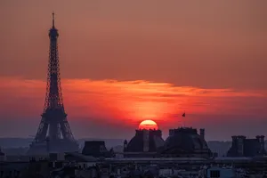 Experience the breathtaking sunset over Paris with the iconic Eiffel Tower silhouette. jigsaw puzzle