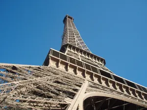 A stunning view from below of the iconic Eiffel Tower against a clear blue sky. jigsaw puzzle