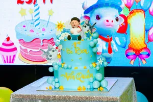Vibrant 1st birthday cake with cartoon decorations and bright colors. jigsaw puzzle