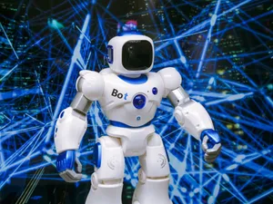 Advanced humanoid robot with glowing blue accents in a digital network setting. jigsaw puzzle