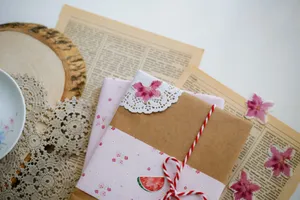 Beautifully wrapped gift with floral paper, lace, and retro paper background for DIY inspiration. jigsaw puzzle