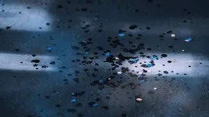 A close-up of colorful confetti scattered on a dark, textured floor. jigsaw puzzle