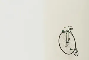 a bicycle hanging from the side of a wall jigsaw puzzle
