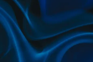 a blue and black background with wavy lines jigsaw puzzle
