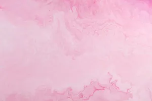 a pink and purple background with a white border jigsaw puzzle