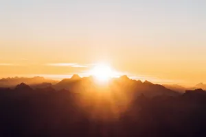 sun setting over the mountains jigsaw puzzle